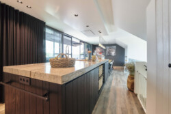 Renovatie handelszaak en triplex appartement